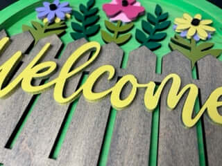 WELCOME WOODEN SIGN- FLOWERS WITH FENCE 14"